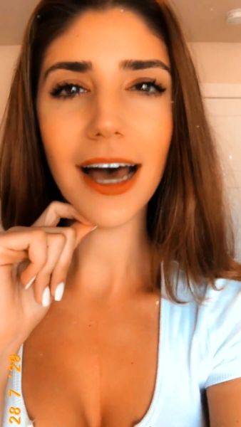 Amateur busty brunette masturbates and does hand job on breastful.com