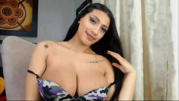 Busty Latina Babe Teaes In Front Of Webcam on breastful.com