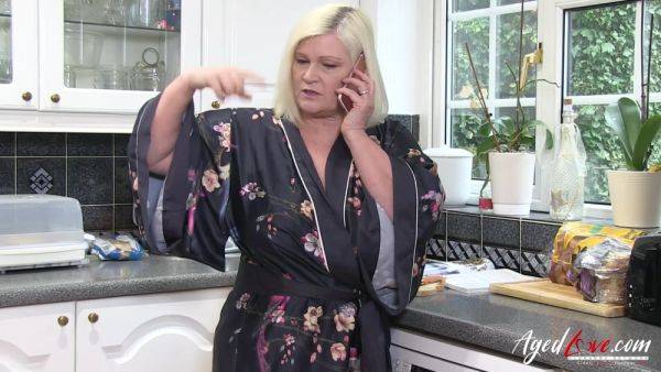 Busty blonde Lacey Starr enjoys with long black cock on breastful.com