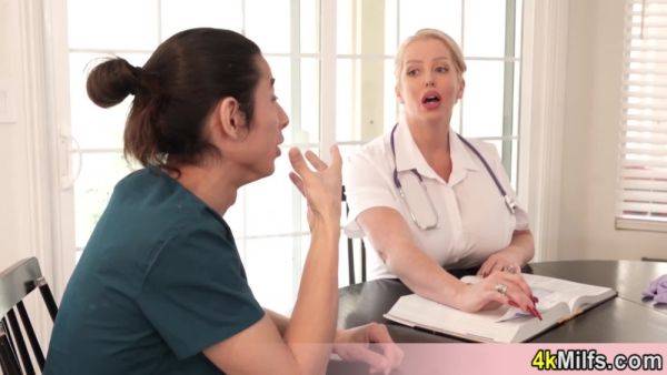 Busty blonde doctress teaches her new doctor about anal examination on breastful.com