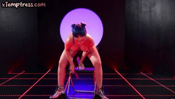 Busty colored hair babe in heels stuffing pussy with sex toy on breastful.com