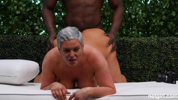 Busty MILF with thick curves attains loud interracial orgasm in backyard sensation on breastful.com