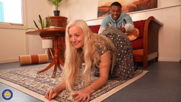 Mature Busty GILF meets a BBC for a blowjob and sex on the couch on breastful.com