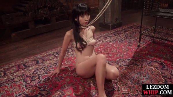 Whipping busty lezdom fucks Asian sub with strapon on breastful.com