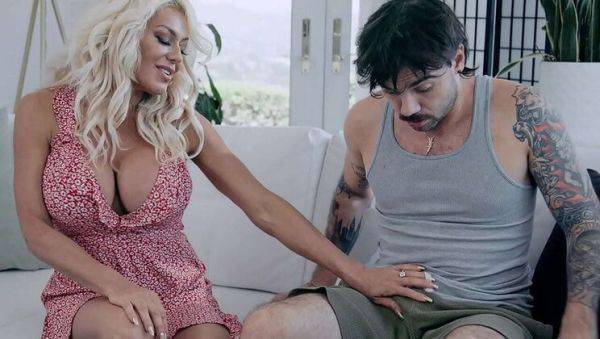 Busty Blonde Teacher Gives Me a Blowjob in Class on breastful.com