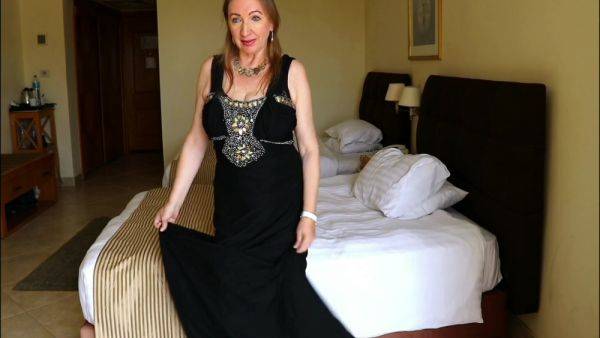Elegant Intrigue: Busty Gilf Mariaolds Black Dress And Stockings Mystery on breastful.com