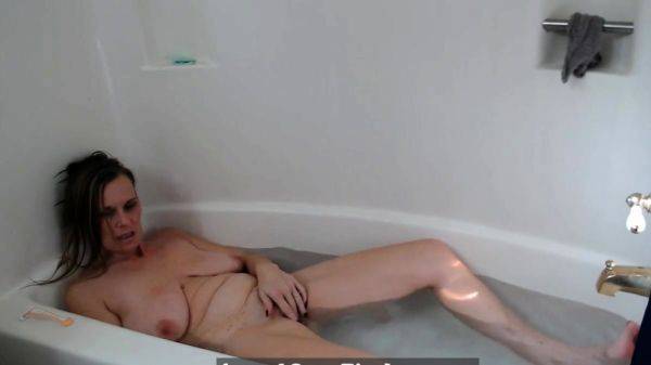 Busty Blonde MILF Masturbates and Orgasms in the Tub on breastful.com