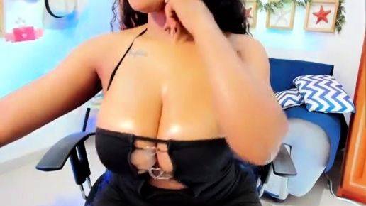 Busty curly brunette with big boobs fucks on couch on breastful.com