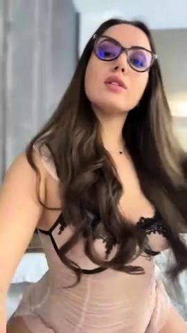 Amateur busty brunette masturbates and does hand job on breastful.com