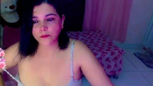 Amateur busty brunette masturbates and does hand job on breastful.com