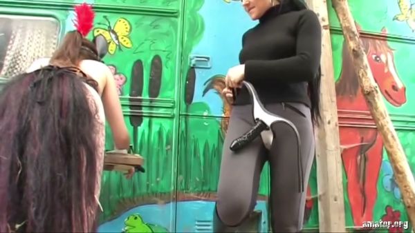 Lesbian strapon play in the woods and rustic dungeon with stockings and bondage on breastful.com