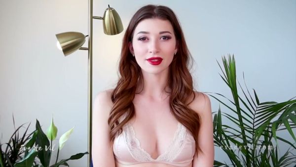 Brown-haired solo girl falls into trance while teasing her own cleavage on webcam on breastful.com