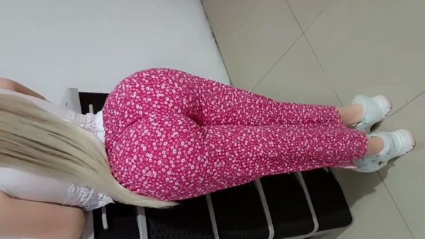 Blonde in pink leggings takes it deep from behind in the gym on breastful.com