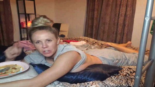 Blonde teases in bed with a playful wink just for you on breastful.com