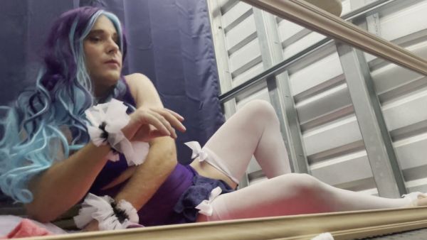 Feminine sissy in frilly purple dress and white stockings pleasures herself on breastful.com