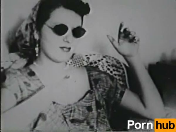 Voluptuous woman in vintage striptease seduces in black and white on breastful.com