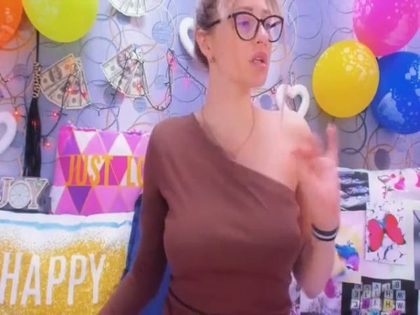 MILF explores her pussy and ass with big purple toys during a solo cam show on breastful.com