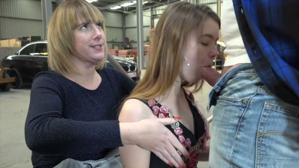 Strict femdom session unfolds in a public warehouse with bondage and deepthroat on breastful.com
