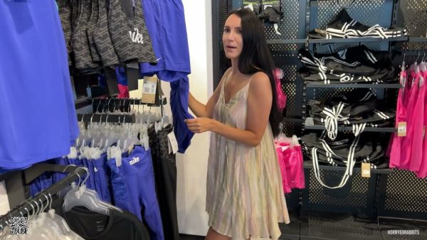Long-haired beauty teases in sheer dress as vibrator play builds to changing room tension on breastful.com