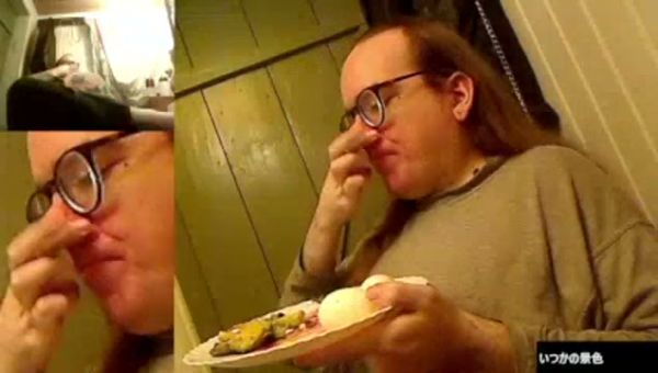 Woman eats a meal in a cozy wooden room on breastful.com