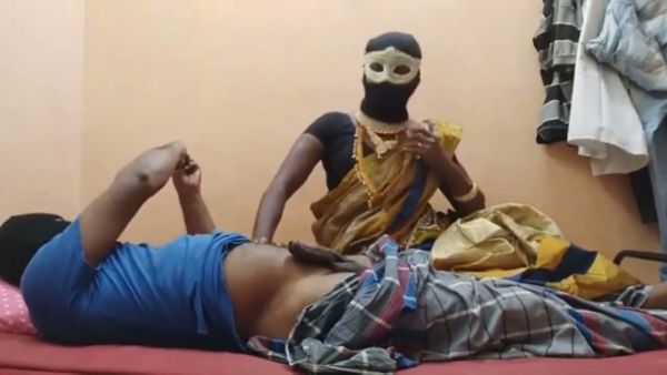 Masked ebony Indian woman teases a sensual ride on her webcam from a red bed - India on breastful.com