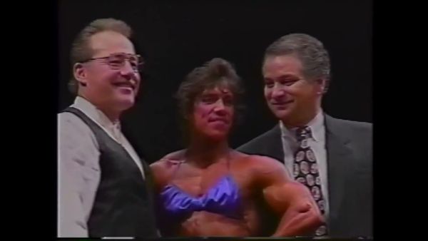 Danielle Leroy strikes a pose on stage at the 1994 NPC USA Nationals - Usa on breastful.com
