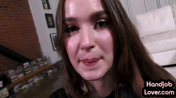 Girlfriend gives oiled handjob in POV from white leather couch on breastful.com