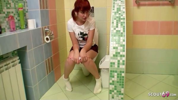 Slender redhead enjoys intimate bath time with a dark-haired man in a vibrant tiled bathroom - Germany on breastful.com
