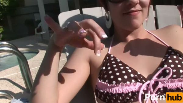 Slim brunette with navel piercing casts off her bikini at sunny poolside party on breastful.com