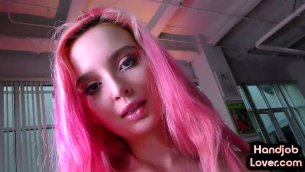 Tattooed pink-haired girlfriend gives handjob in living room on breastful.com