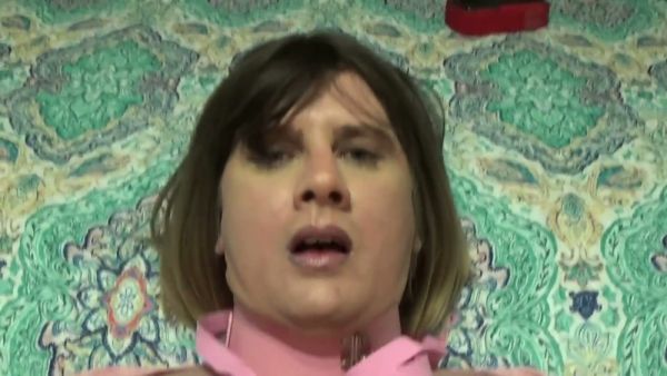 Submissive blonde in pink lingerie takes strapon from dominant African man on breastful.com