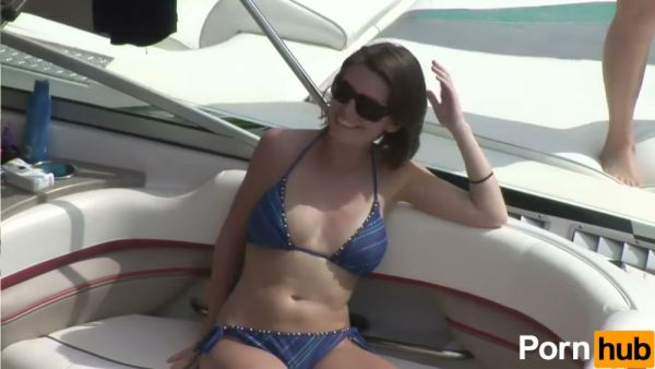 Blonde college girl exposes her natural tits and pussy during a wild boat party on breastful.com