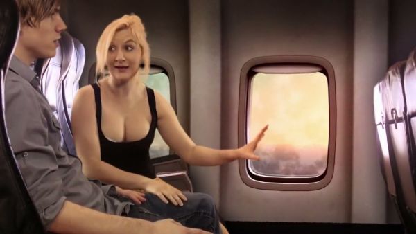 Blonde passenger gives a discreet handjob on a sunset flight on breastful.com