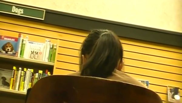 Candid foot fetish moment with a teen girl in the library on breastful.com