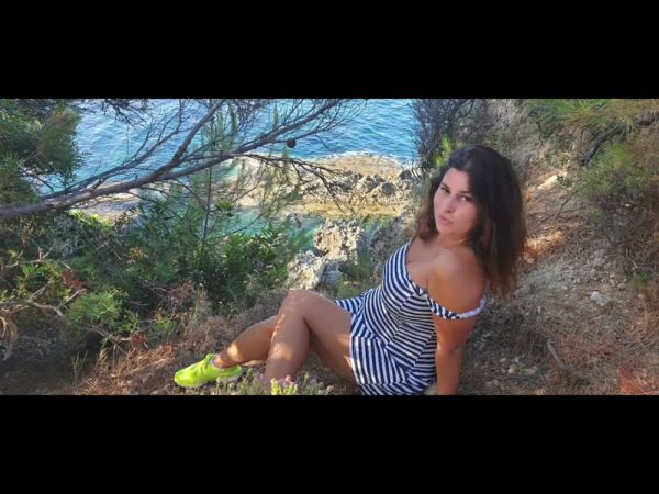 Voluptuous brunette receives a cumshot on the secluded beach rocks on breastful.com