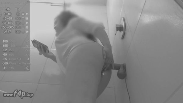 Curvy dark-skinned woman trains deep anal stretching in black and white bathroom selfie on breastful.com