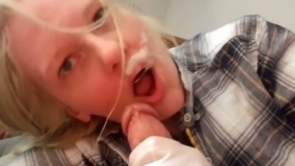 Blonde MILF gives a white-gloved handjob and blowjob ending in a messy facial on breastful.com