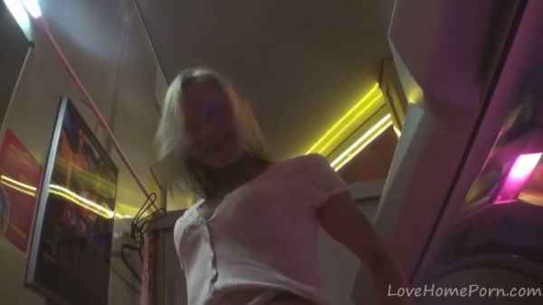 Blonde solo girl spreads wide in a glowing public tanning bed on breastful.com