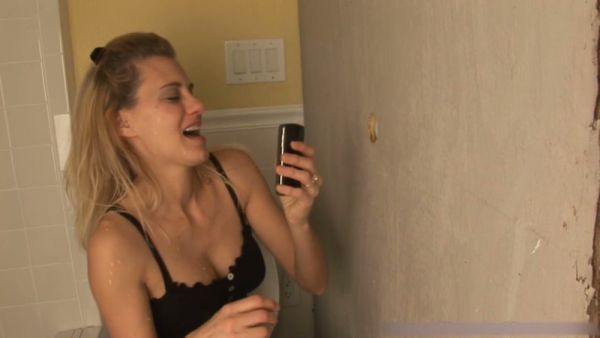 Blonde wife visits a public glory hole and takes a thick cumshot on her face on breastful.com