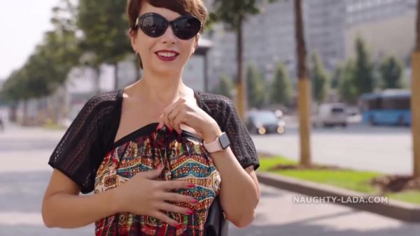 Young woman exposes bare buttocks on a zebra crossing while two mature women watch on breastful.com