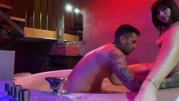 Brunette with tattoos rides the jacuzzi edge until he cums on her back on breastful.com