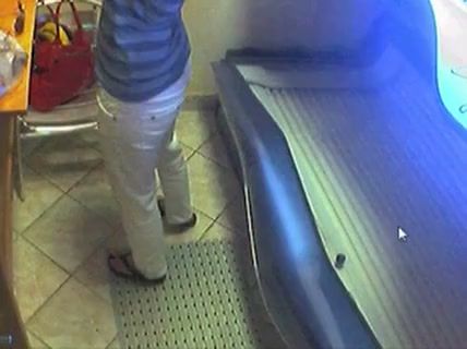 Lone figure caught on hidden cam inside glowing solarium on breastful.com
