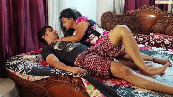 Dark-haired couple lost in passionate intimacy on a floral bed - Ireland - India - Germany - France - Italy - Spain - Canada - Australia - Singapore - Usa - Britain - Netherlands on breastful.com