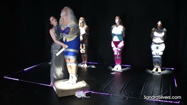 Chubby contestant faces femdom discipline on a kinky gameshow stage on breastful.com