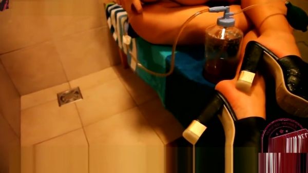 Amateur wife explores her enema fetish with milk and toys in the bathroom on breastful.com