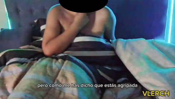 Young Latina amateur shows off her bare ass in a dim blue-lit bedroom on breastful.com