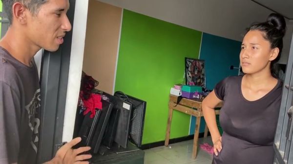 Dark-haired young woman meets Asian man by a car before moving indoors for passionate intimacy - Venezuela on breastful.com