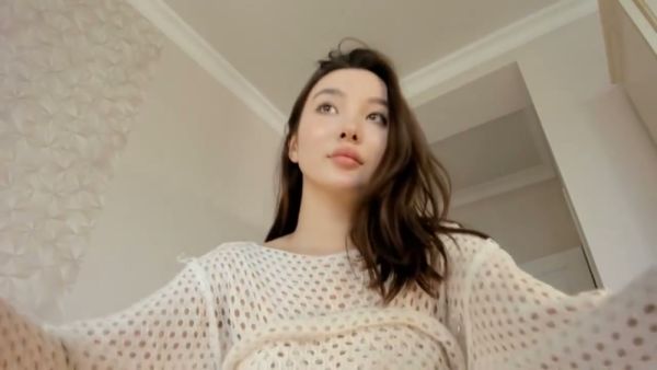 Korean woman pleasures herself with a black vibrator on webcam - North Korea on breastful.com