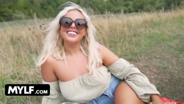 Tattooed blonde MILF takes a facial from a muscular stud after a rural picnic on breastful.com