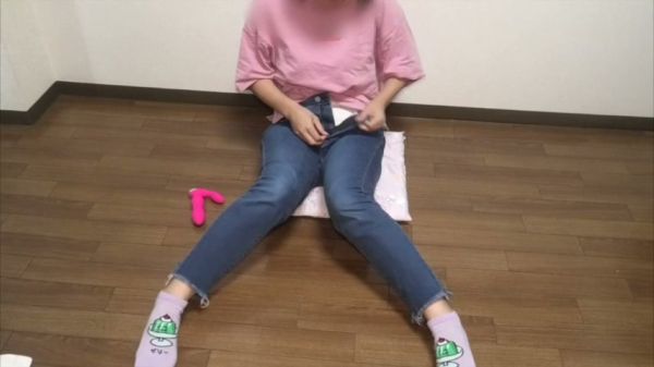 Alone on a pink pillow, a figure explores pleasure with a bright pink dildo - Japan on breastful.com